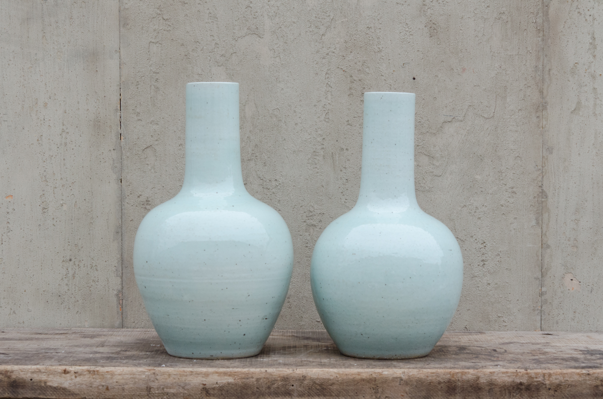 A Pair Of Celadon Long Neck Vases Boulevard Urban Living